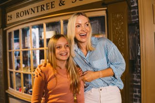 A Family Pose Infront Of A Replica Of Rowntree'S Original York Shopfront (1)